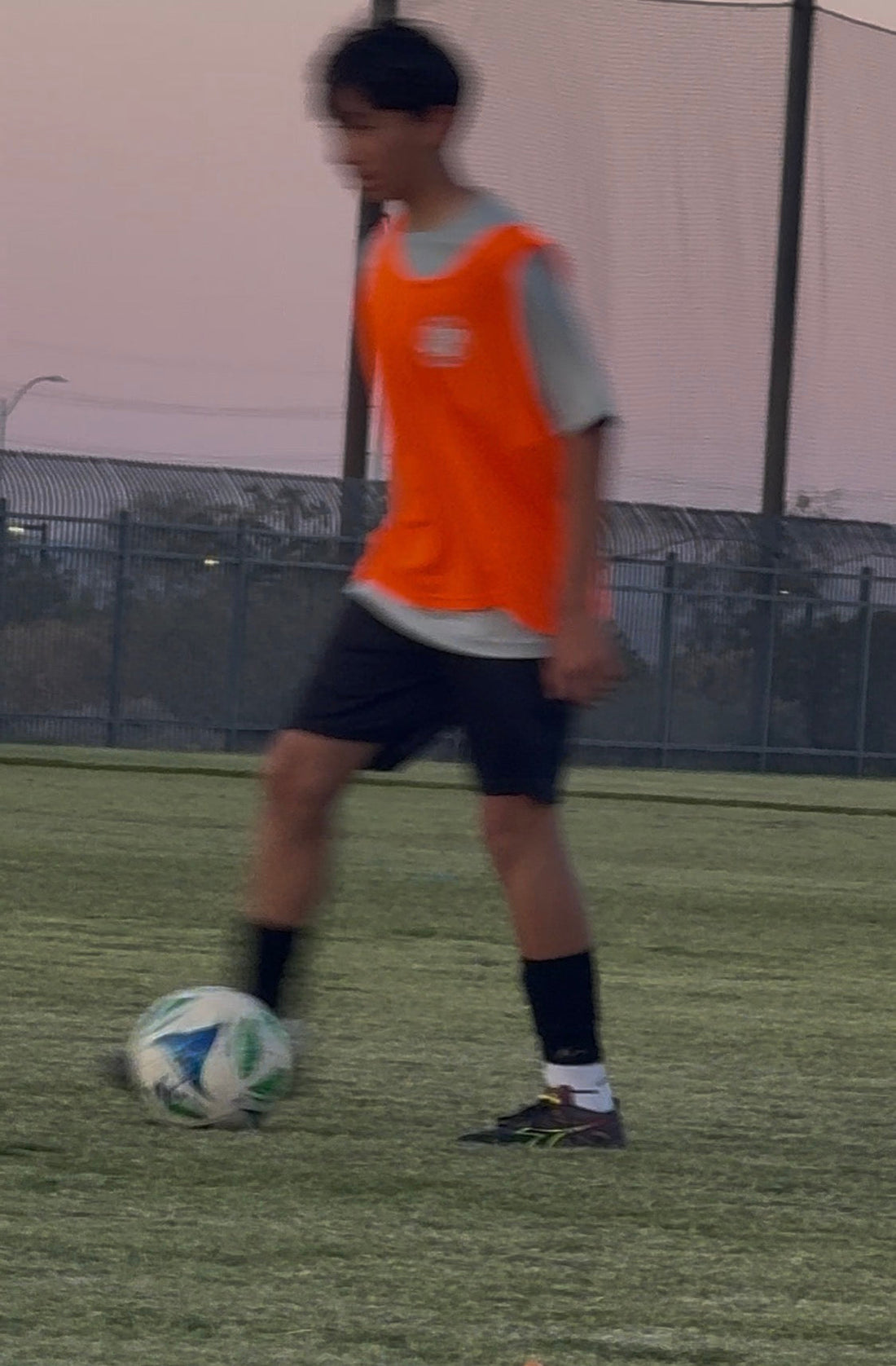 Carullo youth player wearing Zero Give Grip socks while playing soccer