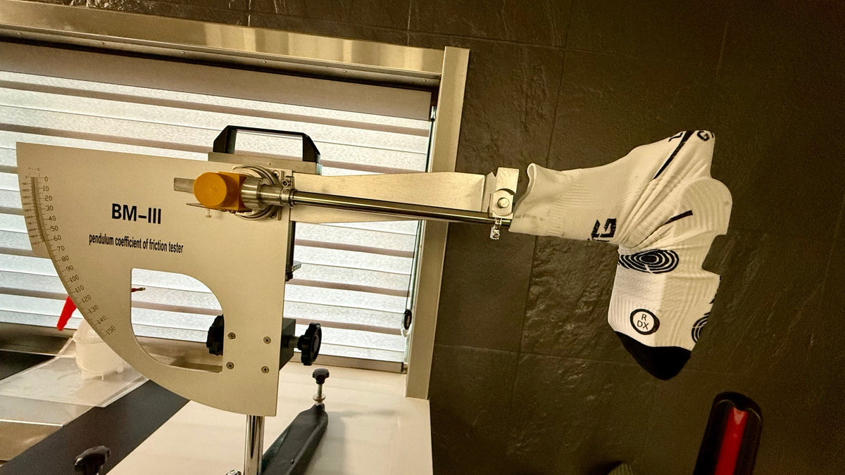 ZERO GIVE soccer grip sock mounted on a BM-III pendulum friction tester for Case Study 02
